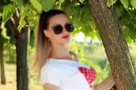 a woman under a tree