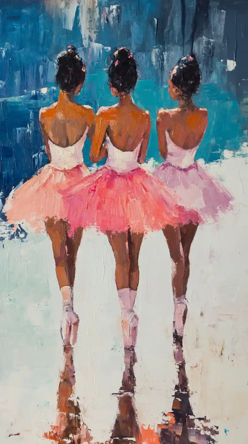 Three ballerinas in tutus standing en pointe from behind