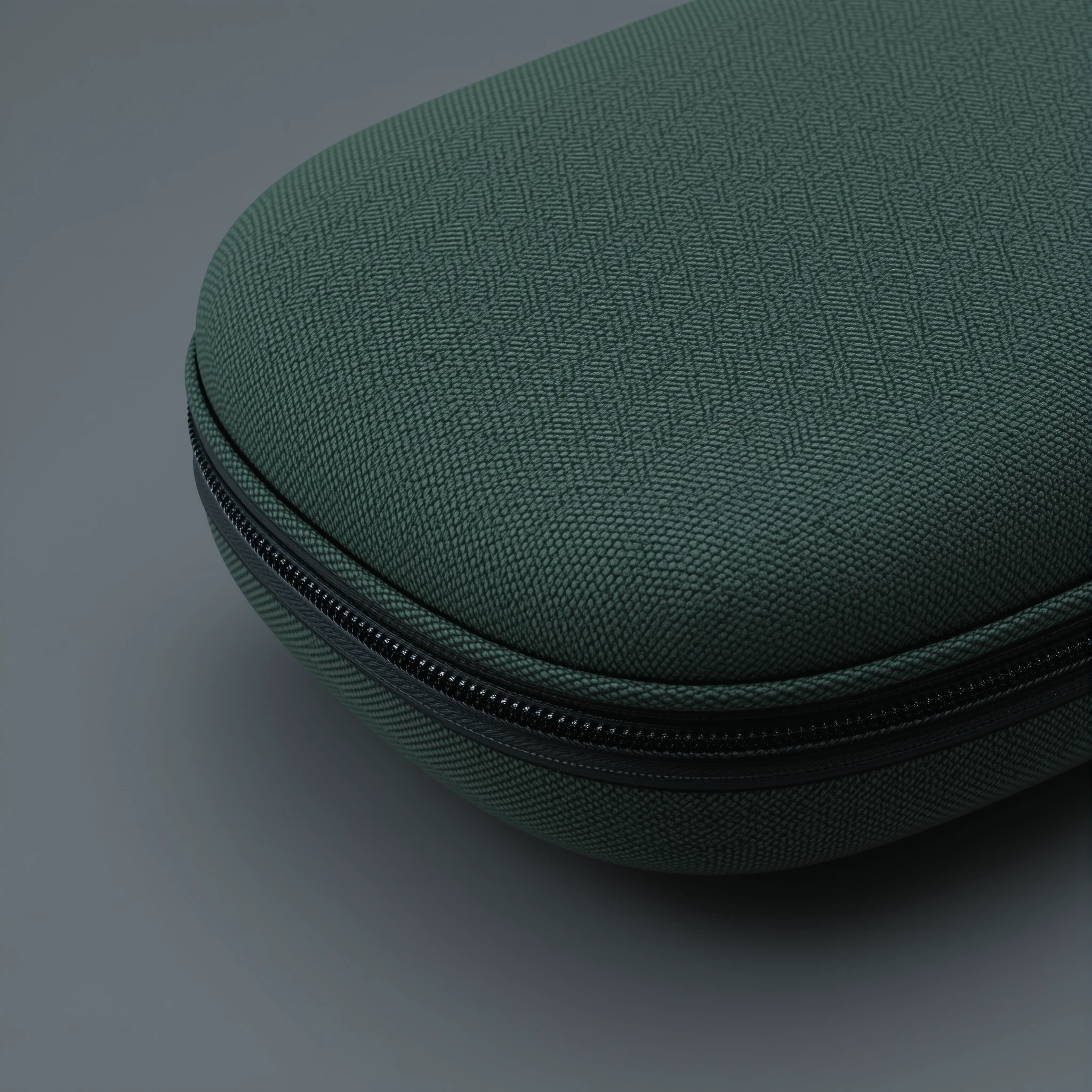 Close up green headphone case on solid gray background