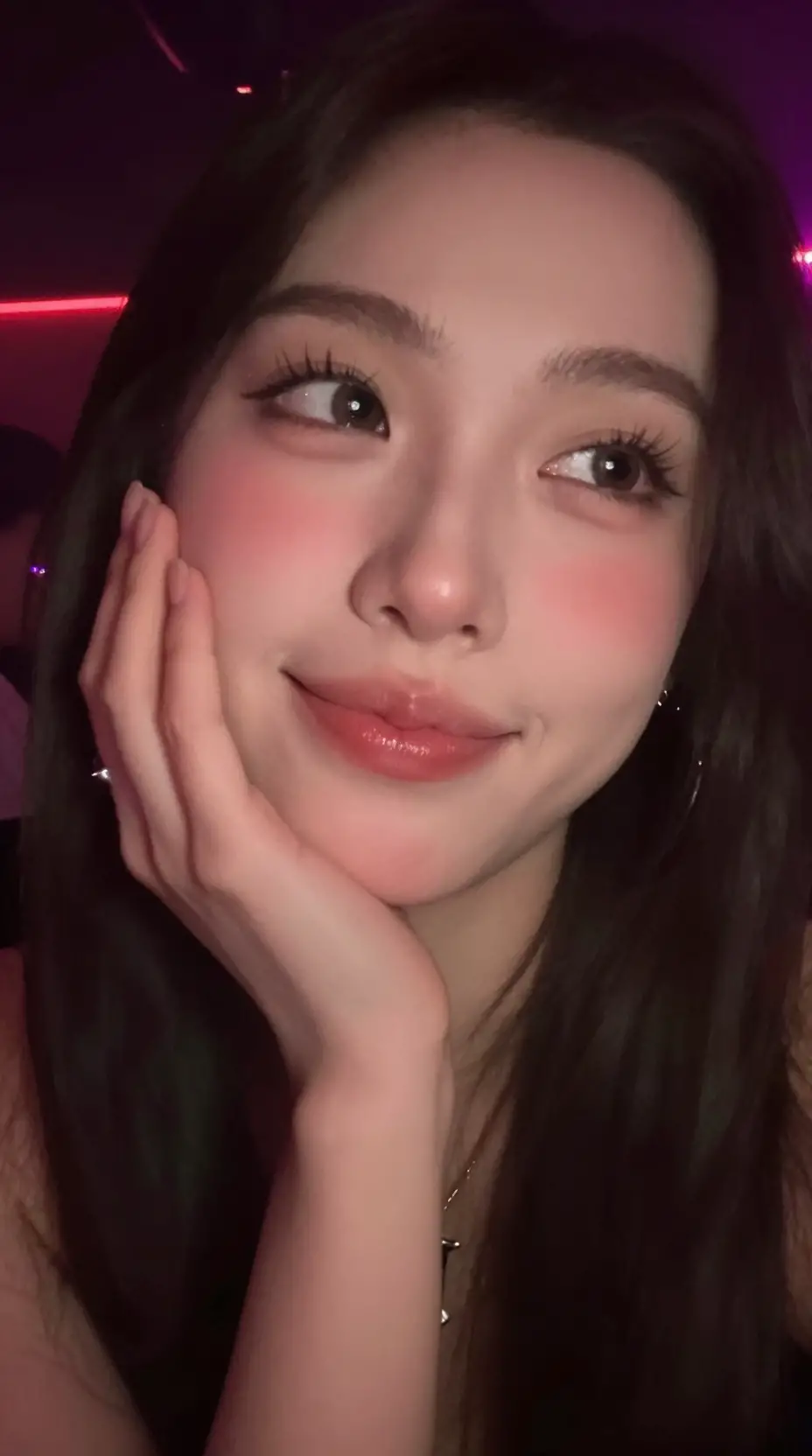 Blurry close up selfie of a loving girl in nightclub