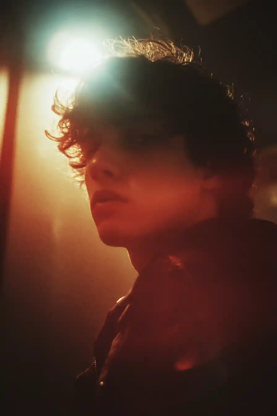 Dramatic cinematic scene of troubled youth under harsh lights