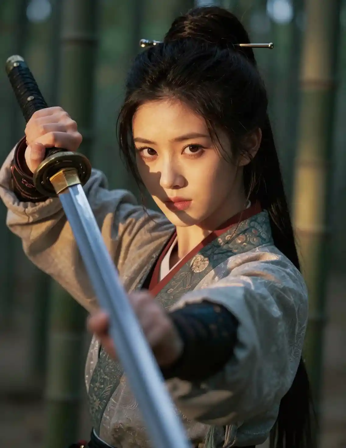 Young samurai woman aims her sword in bamboo forest