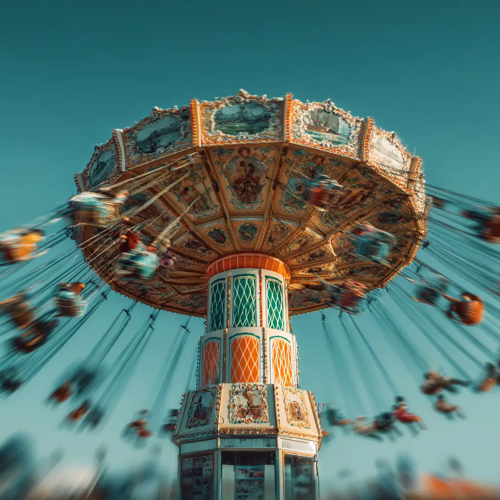 Spinning carnival swing ride against a clear teal sky