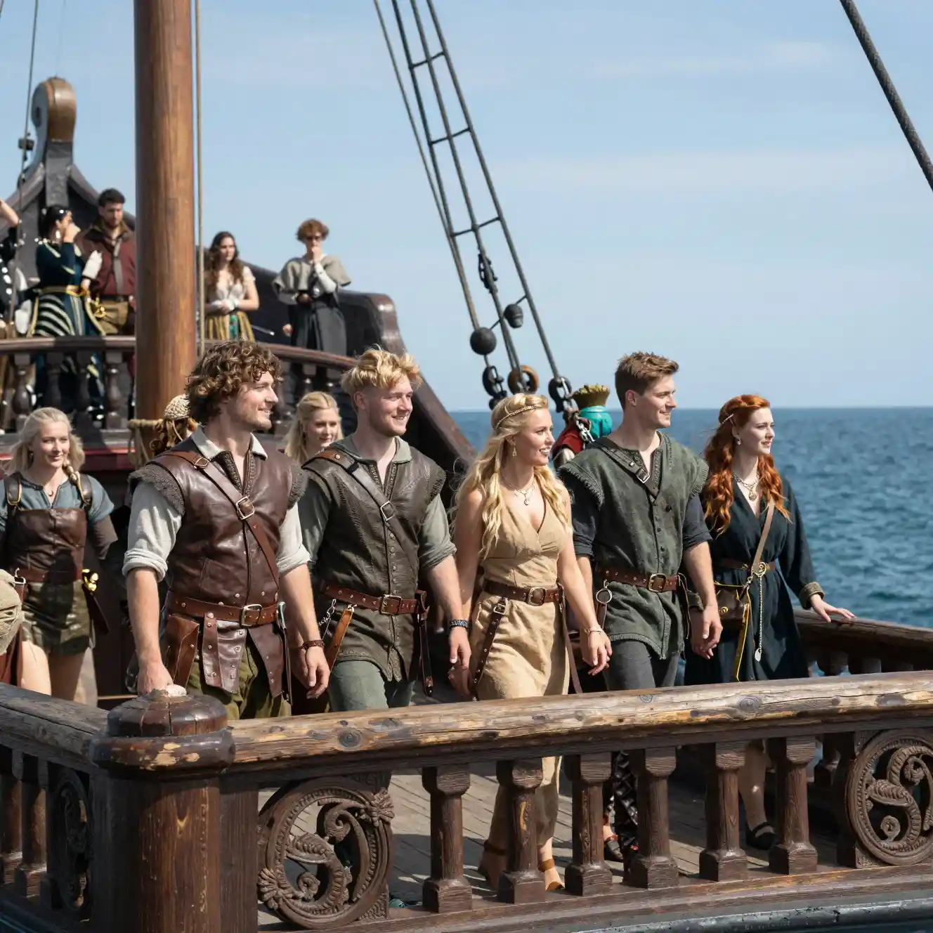 Young adventurers on a fantasy ship enjoying the sea