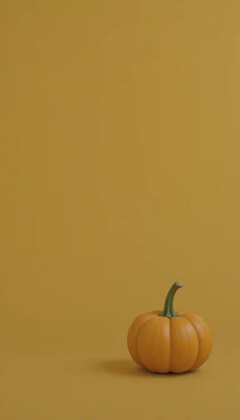Einzelner Kürbis auf leuchtend orangem, minimalistischem Hintergrund