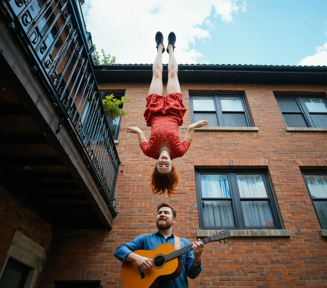 Woman doing a handstand on a balcony above guitar player