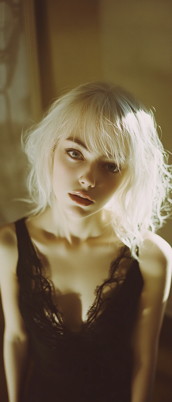 Nostalgic film portrait of a platinum blonde gothic girl