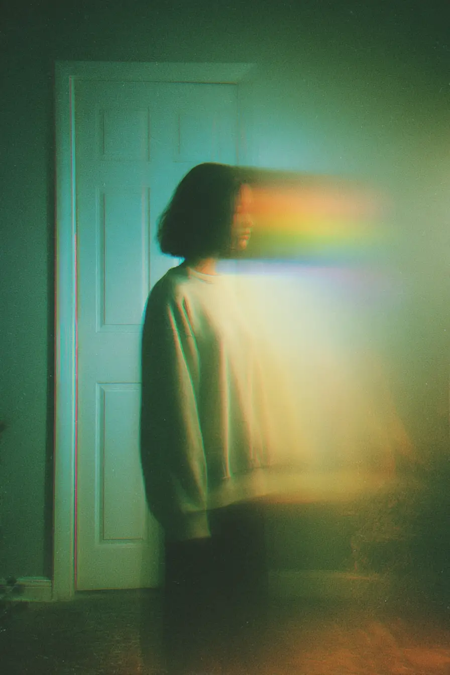 Woman dissolving in surreal cinematic motion blur