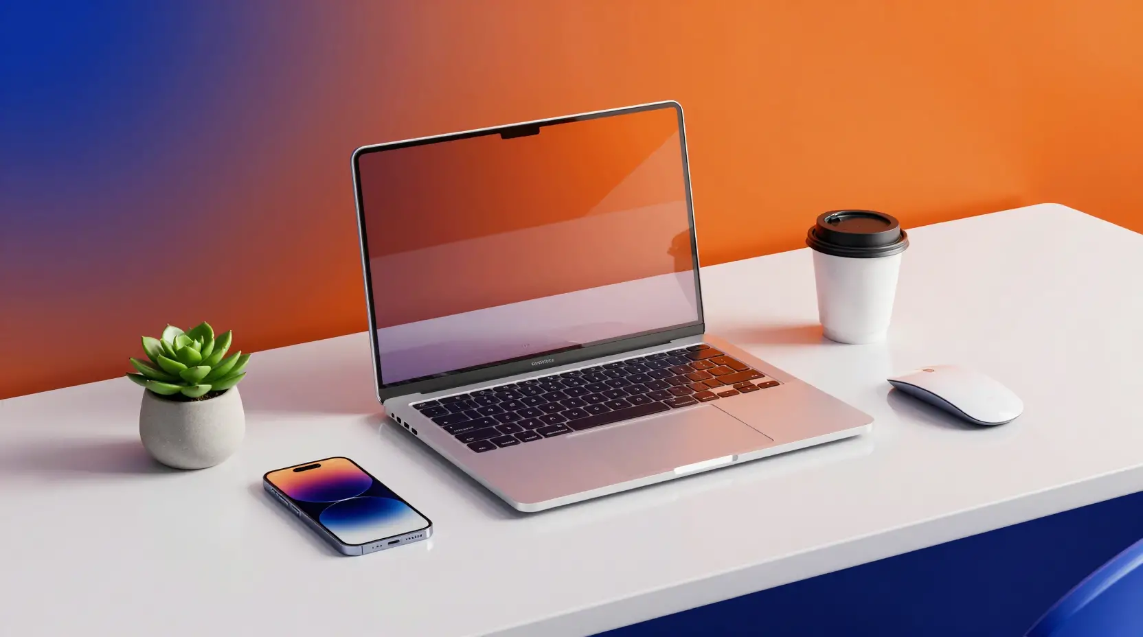 Modern glass desk setup with transparent laptop and phone