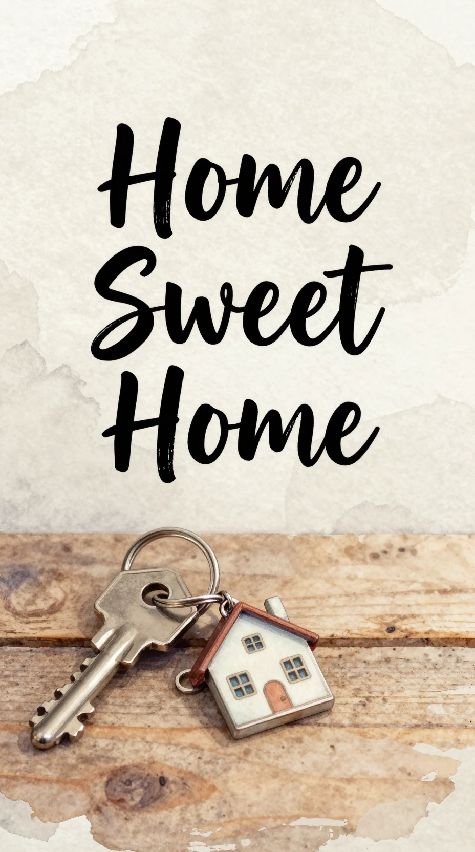 Watercolor key and house keychain on warm wooden surface