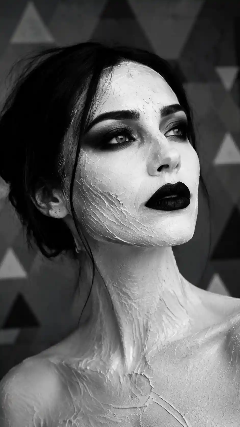 Black and white close up portrait of a serene woman