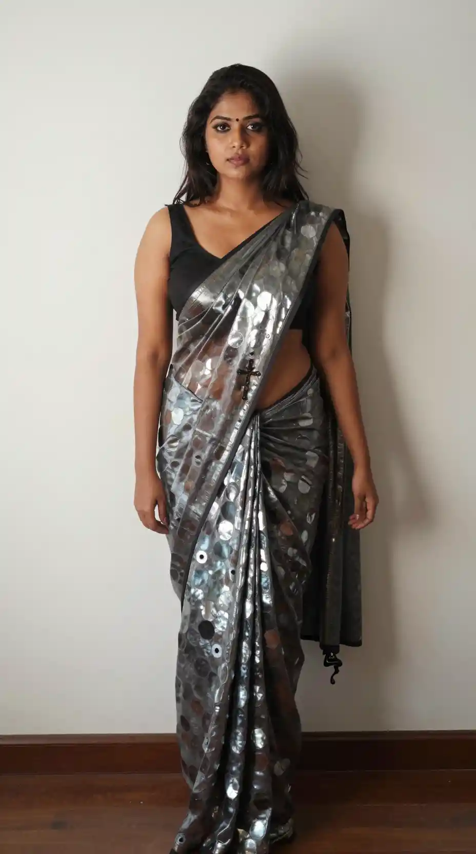 Tamil woman in glossy saree showing navel and collarbone