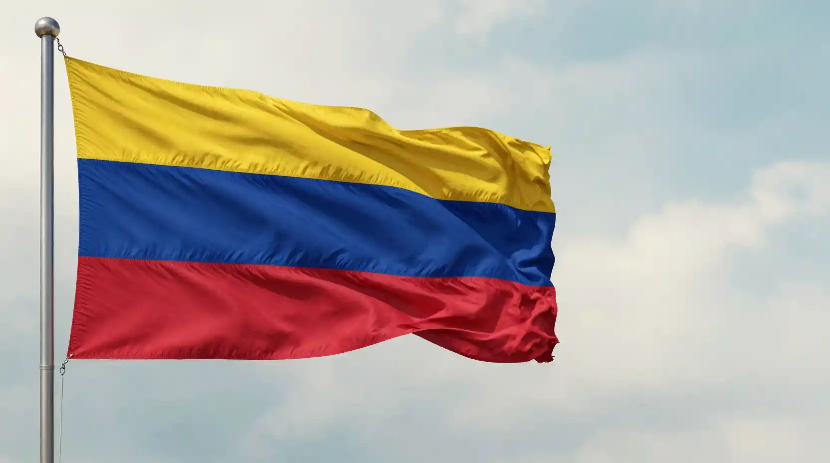 Ceremonial tricolor flag on pole with soft abstract backdrop
