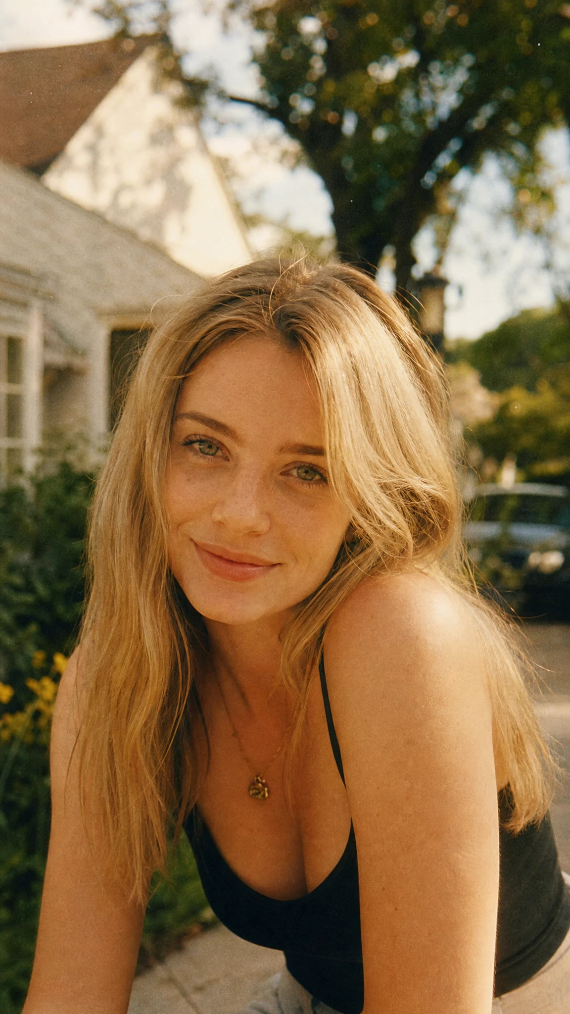 Nostalgic film portrait of a young blonde girl