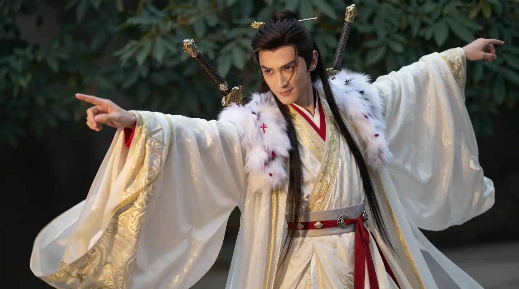 Arrogant Chinese swordsman in ornate white and gold robes
