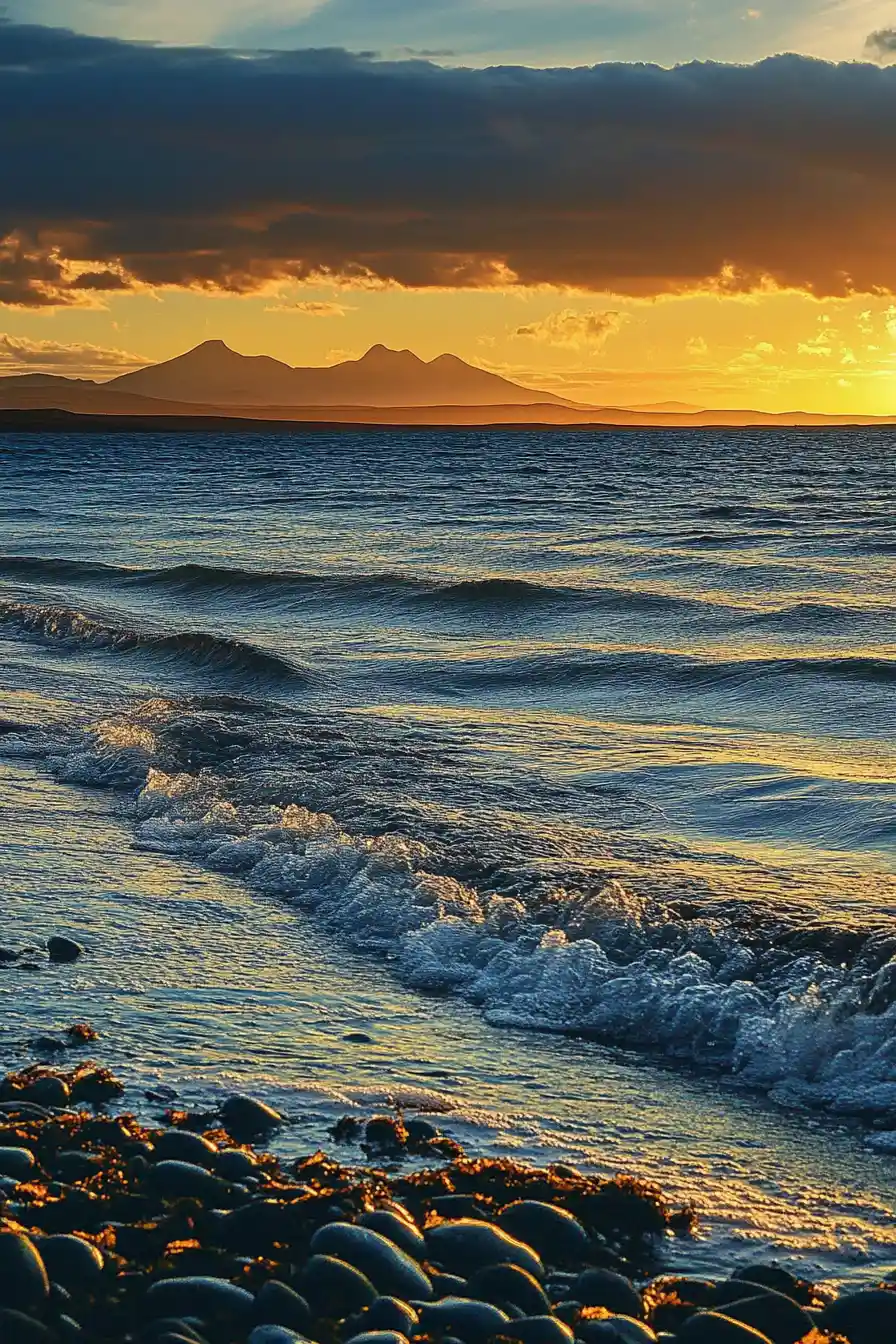 Colorful coastal seascape with rippling evening ocean