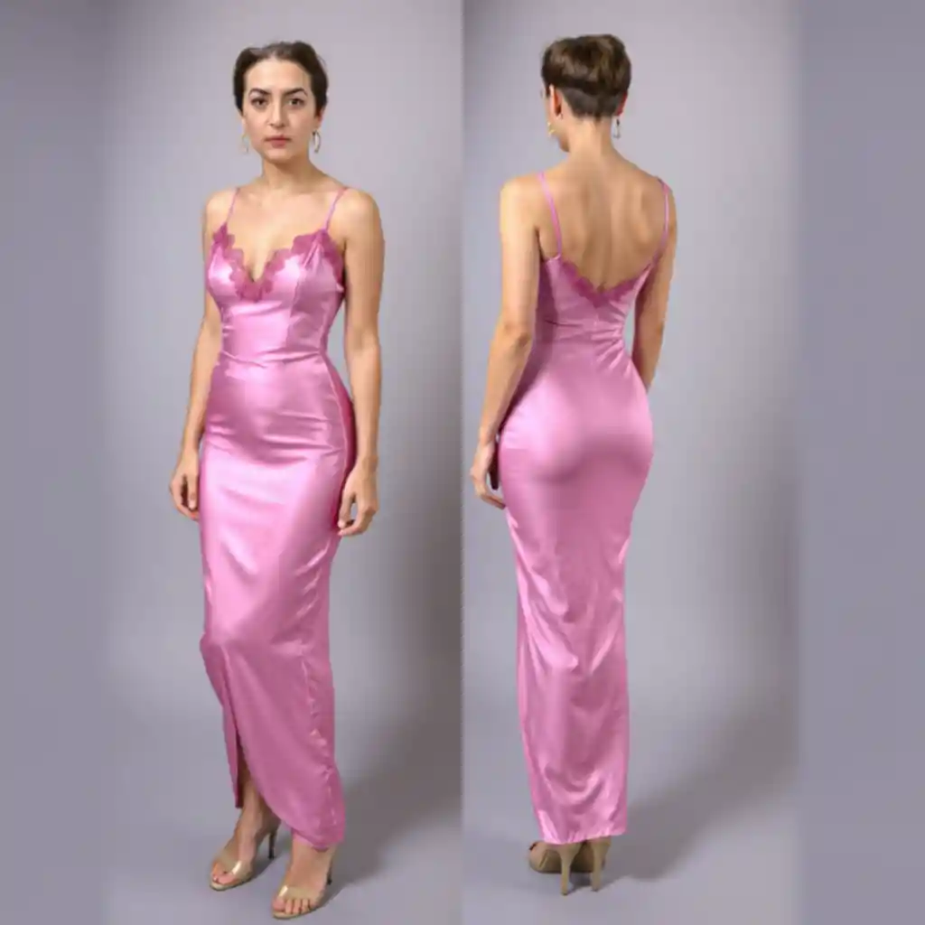 Woman in pink sheer silk gown with bare shoulders