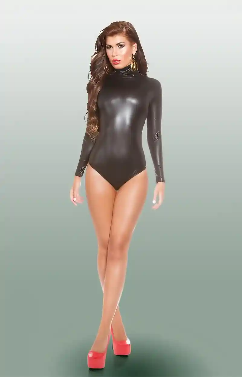 Confident woman in black bodysuit on gradient studio background