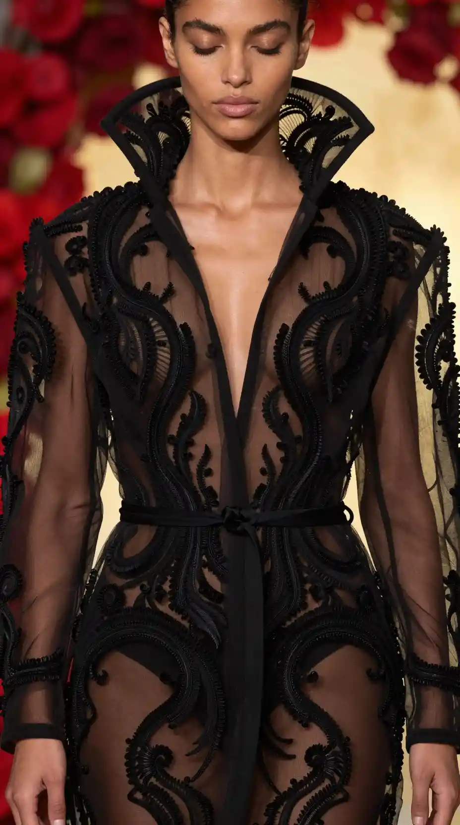 Brazilian woman in black couture coat with serene expression