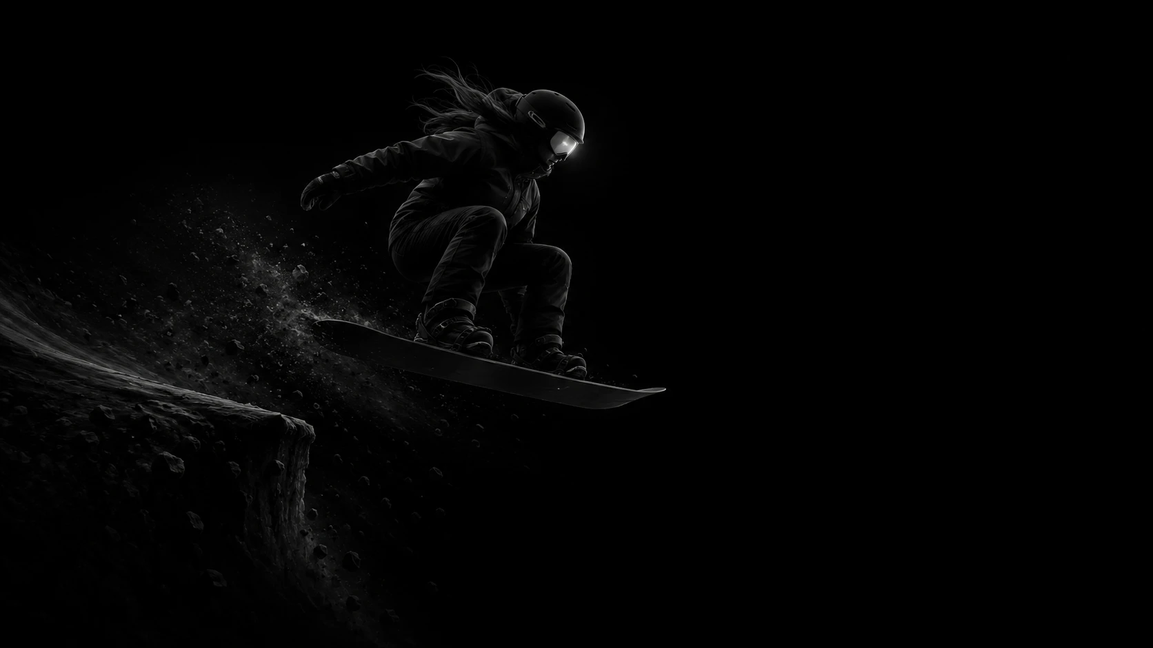Snowboarder girl leaping in silhouette above a dark void