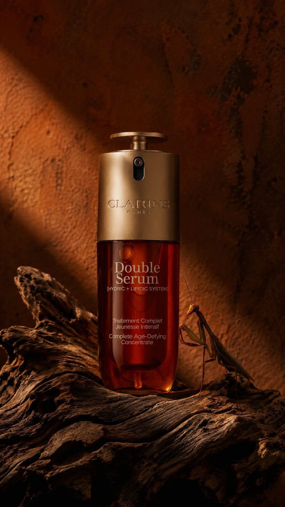Dark skincare bottle on weathered wood in warm studio