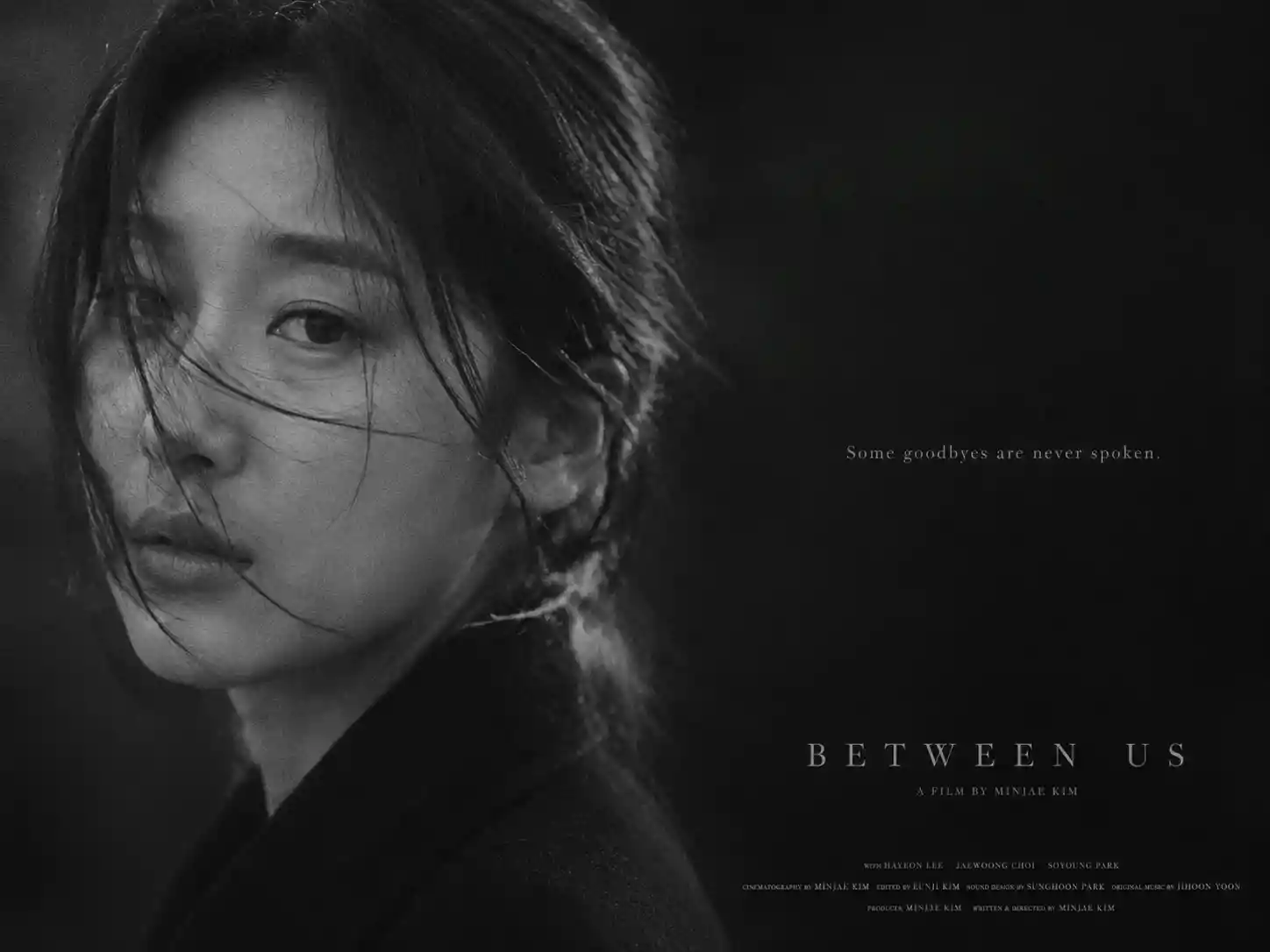 Black and white portrait of a Korean woman in quiet farewell