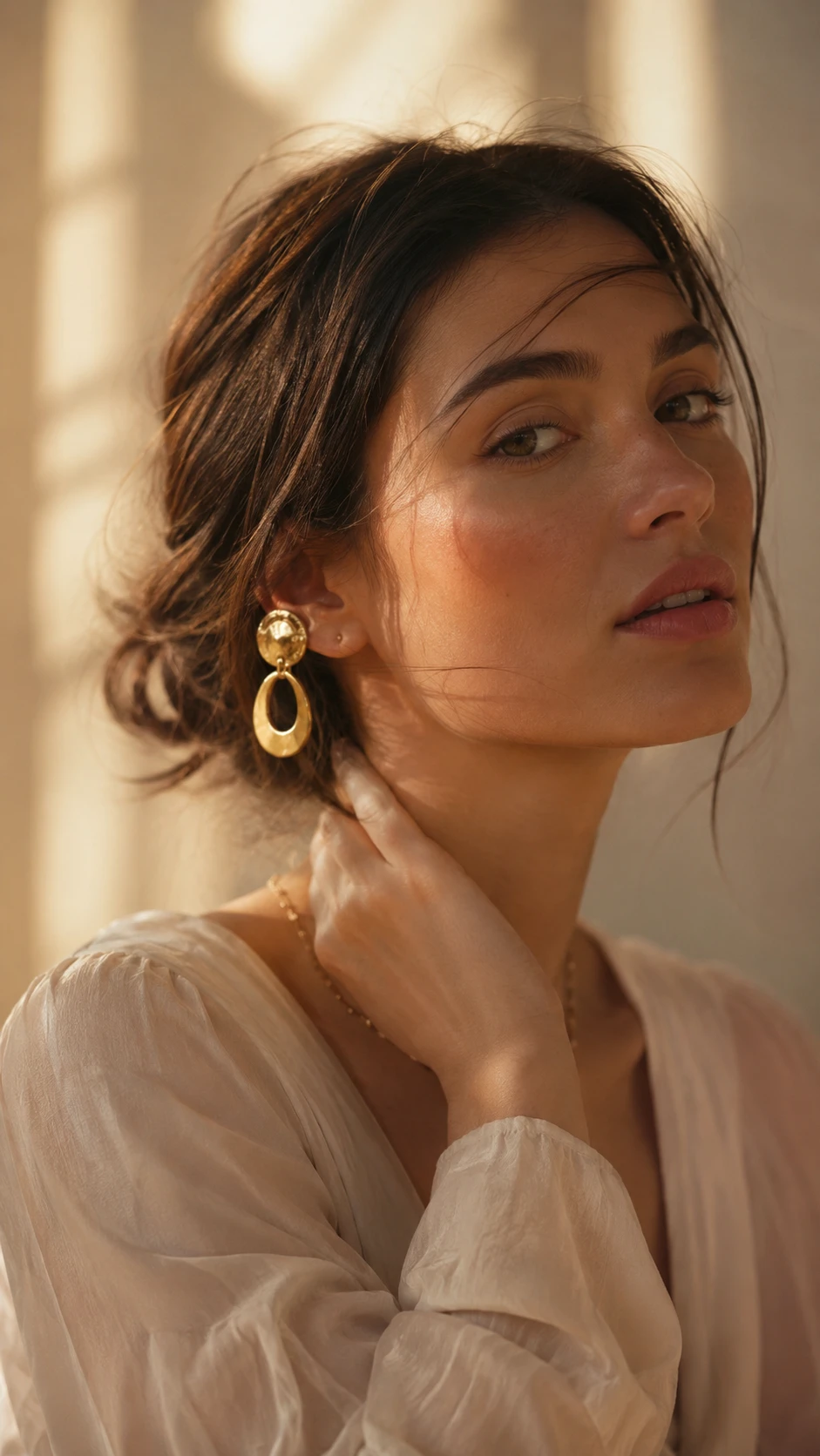Young woman portrait in warm window sunlight