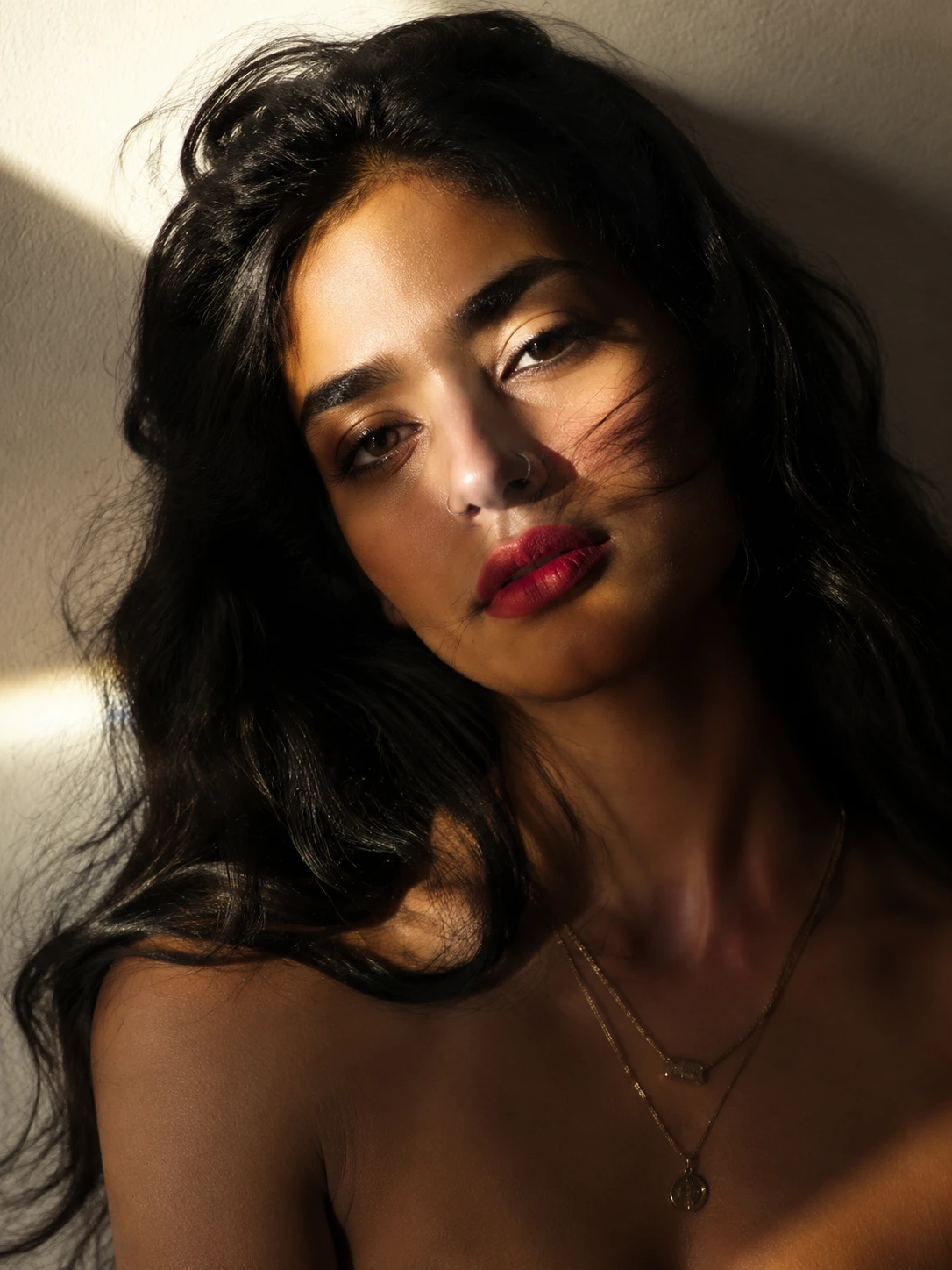 Cinematic close up portrait of a woman in moody light