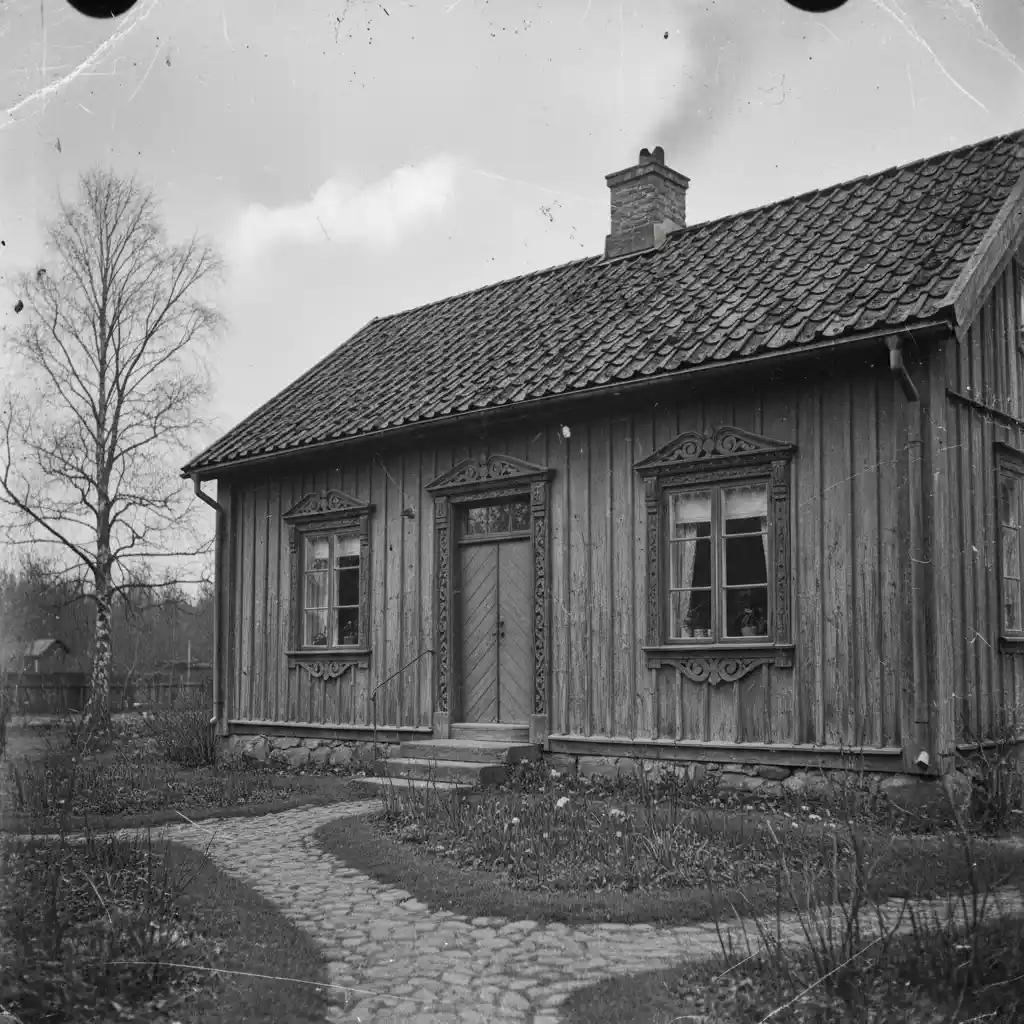 Vintage Swedish wooden house with weathered rustic facade