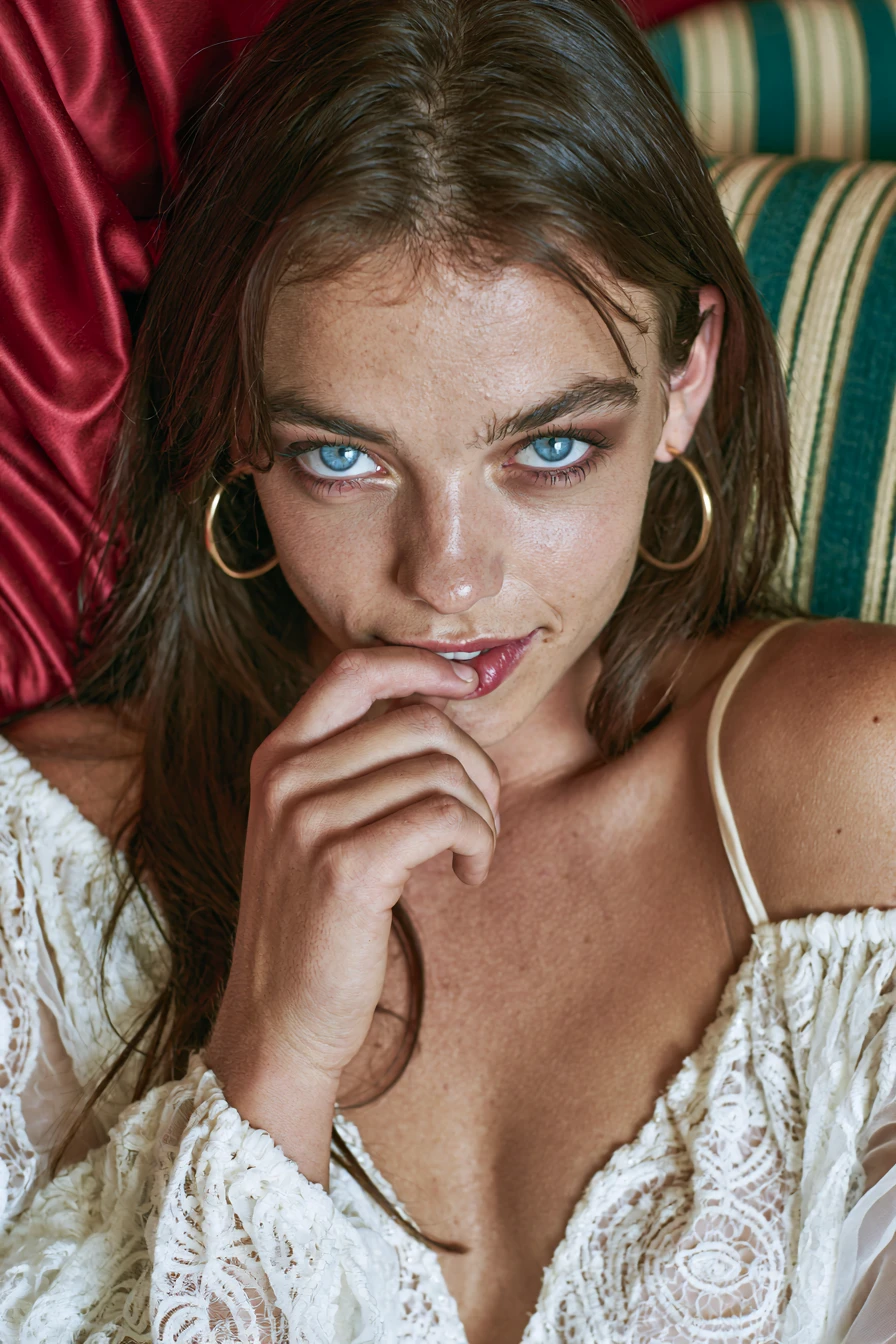 Young woman touching lips in soft portrait scene