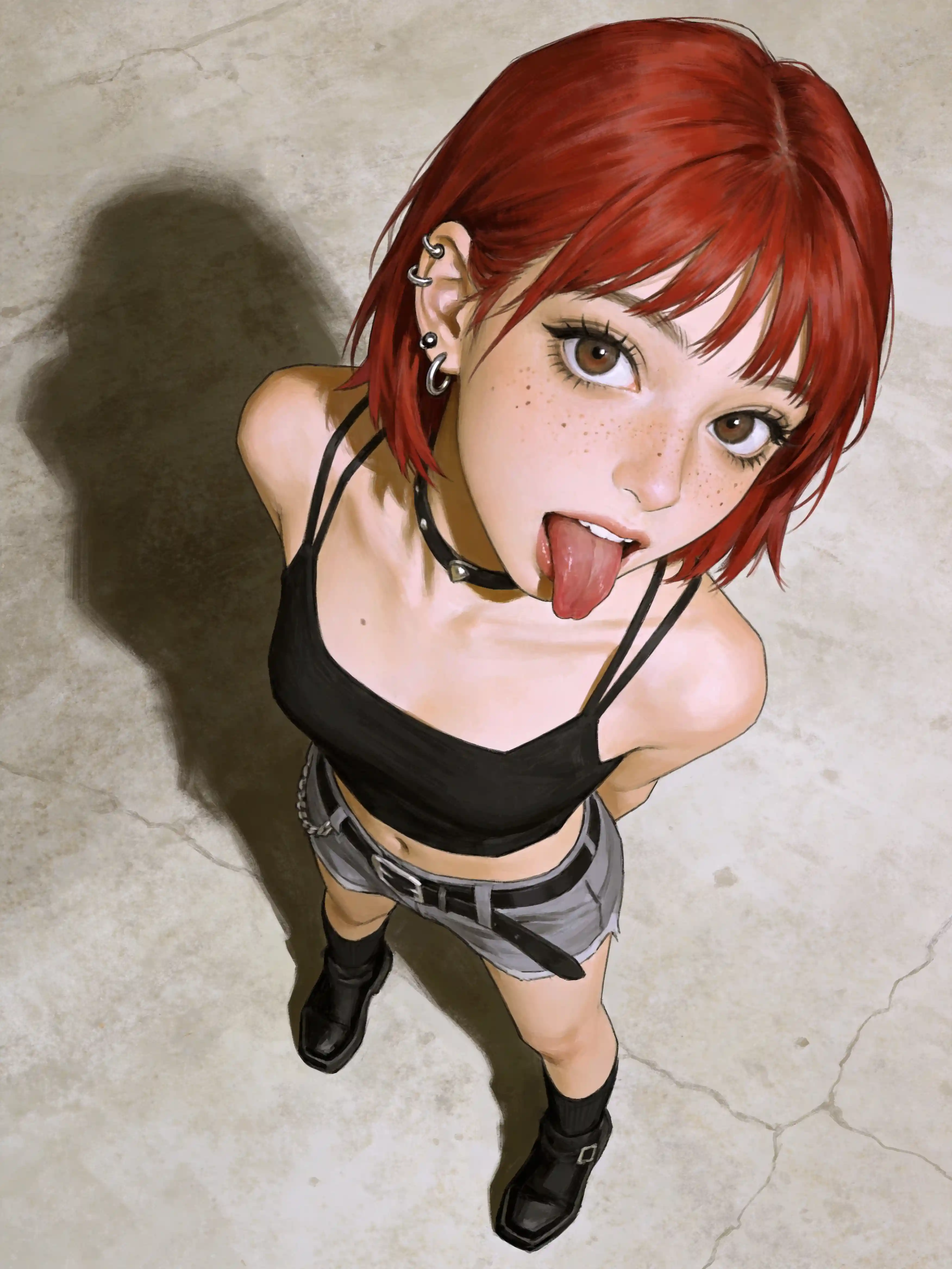 Whimsical red haired woman sticking out her tongue playfully