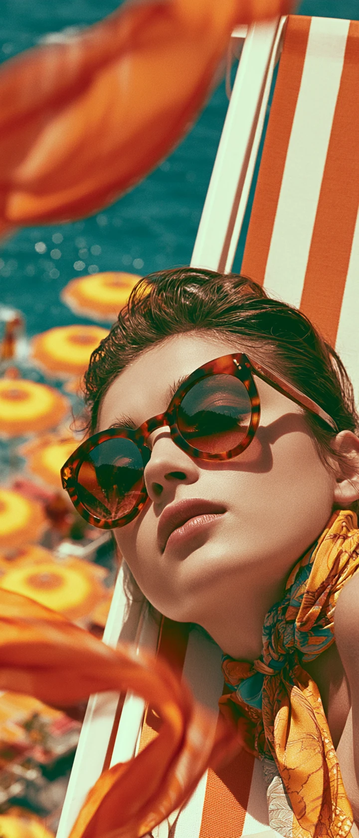 Woman in sunglasses on cliffside balcony in Positano