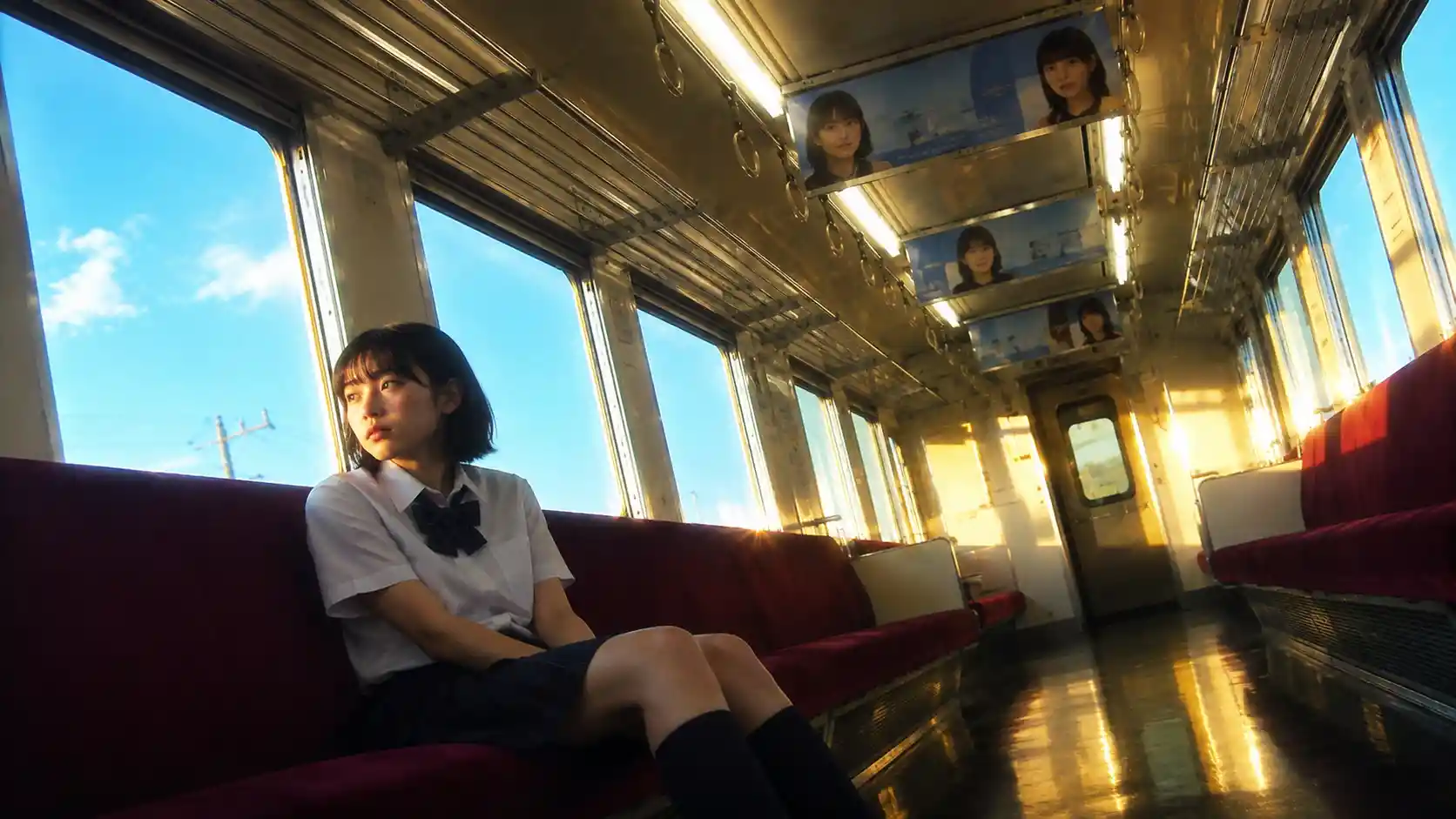 Melancholic teen girl in empty vintage Japanese train
