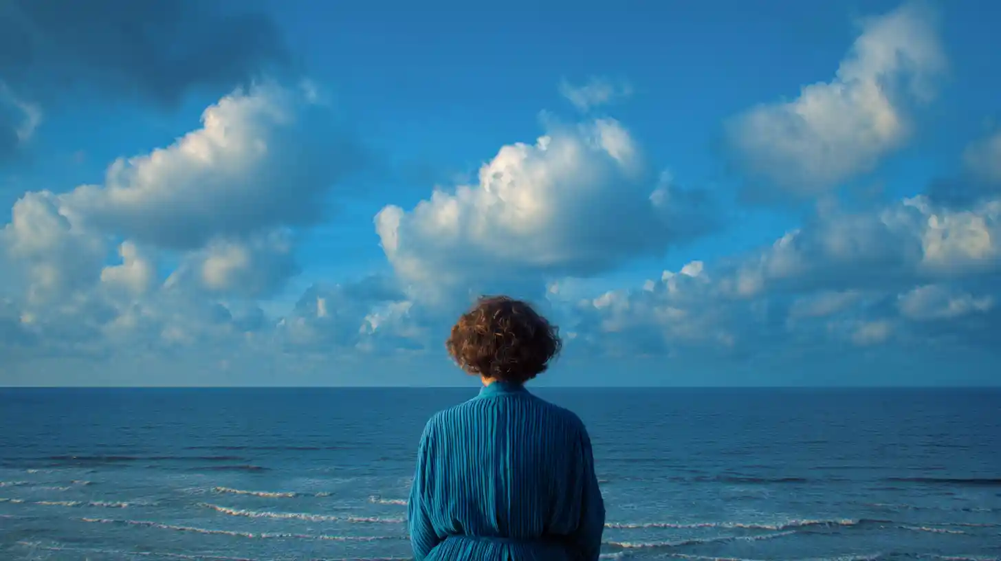 Mature surreal woman weaving flowers from ocean waves