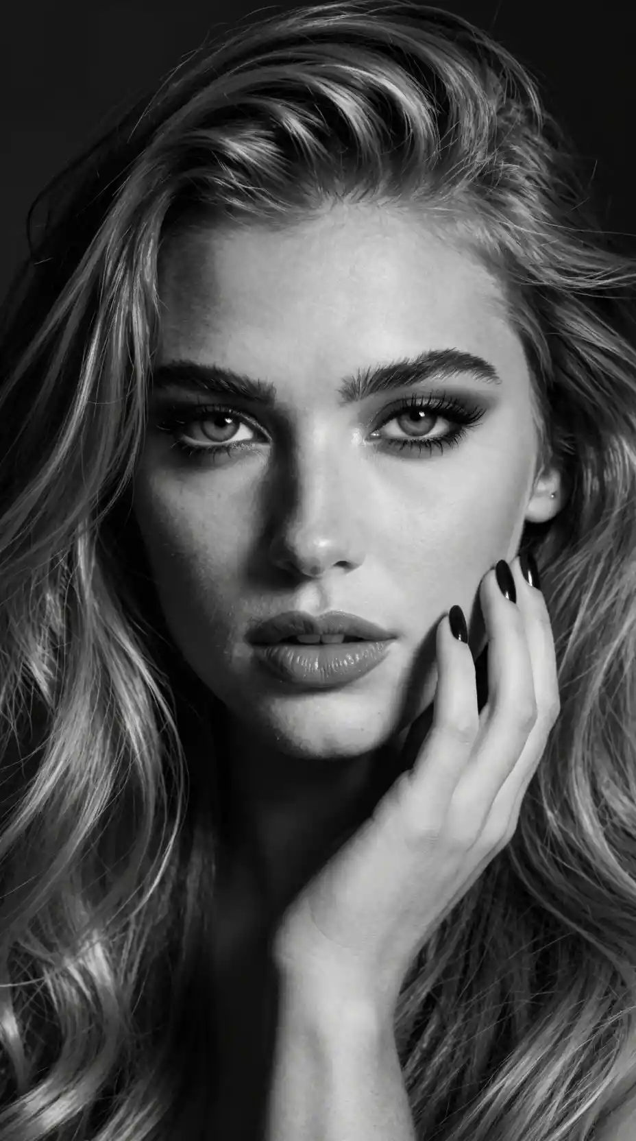 Dramatic black and white close up portrait of a woman