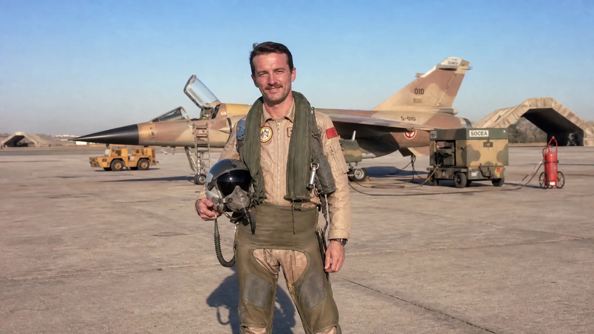 Moroccan fighter pilot on runway at military airbase