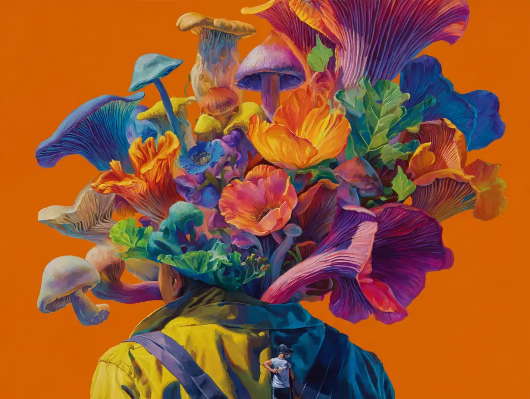 A man's head was covered by a various of flower