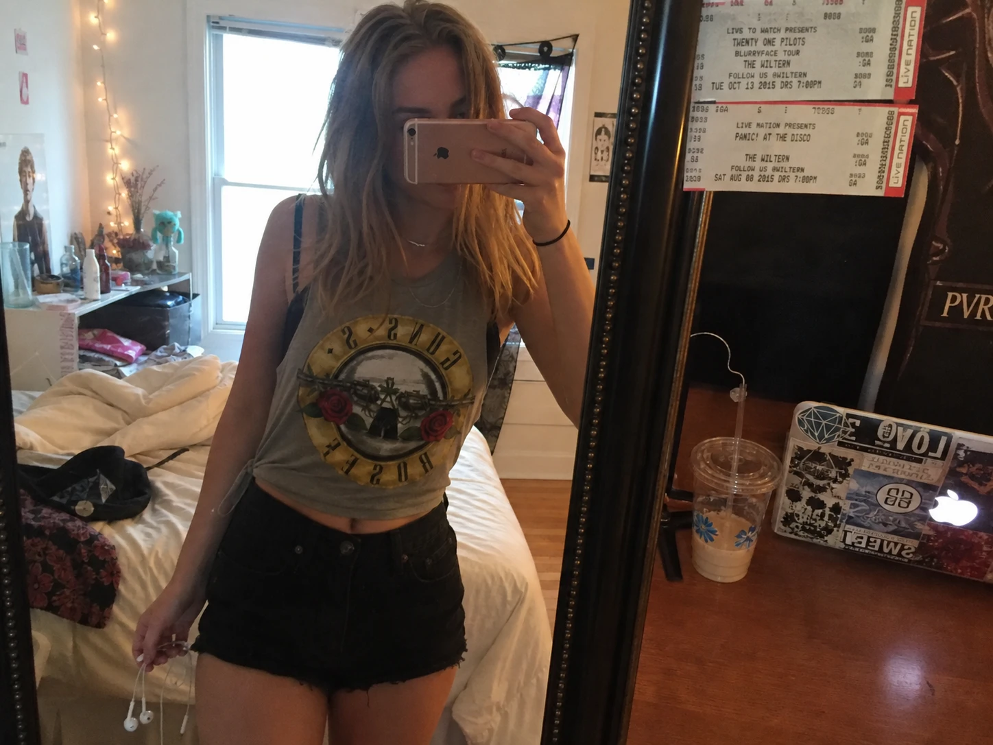 A rushed bedroom mirror selfie taken before a concert in summer 2016