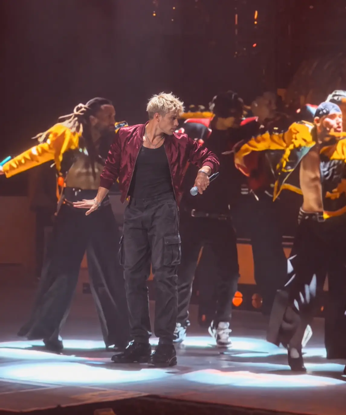 Create an AI video featuring a man in a red jacket performing a “Talk Dirty” dance